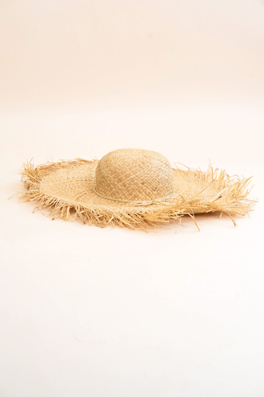 Frayed Straw Hat